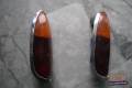 A pair of Flat taillight lenses